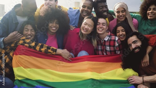 Happy diverse young friends celebrating gay pride festival - LGBTQ community concept