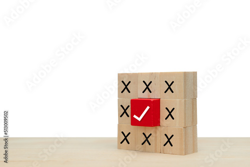 True and false or Yes or No symbols on wooden cube on white background