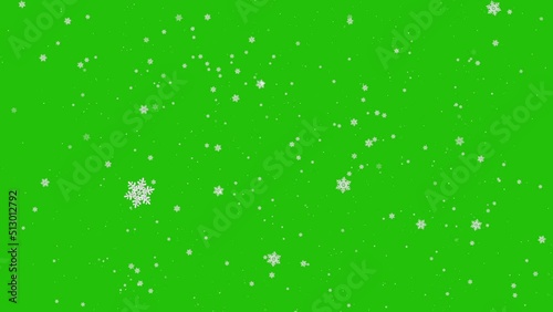 Big big falling snowflakes on green screen background. snowflakes video color key.