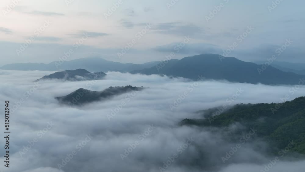 Aerial pullback on Takeda Castle surrounded by sea of fog at dawn Aerial pullback on Takeda Castle surrounded by sea of fog at dawn