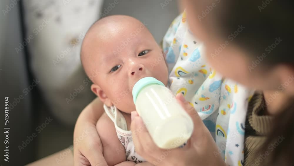 Asian baby eating milk with mother,
infant boy baby family relation Asian baby eating milk with mother,
infant boy baby family relation