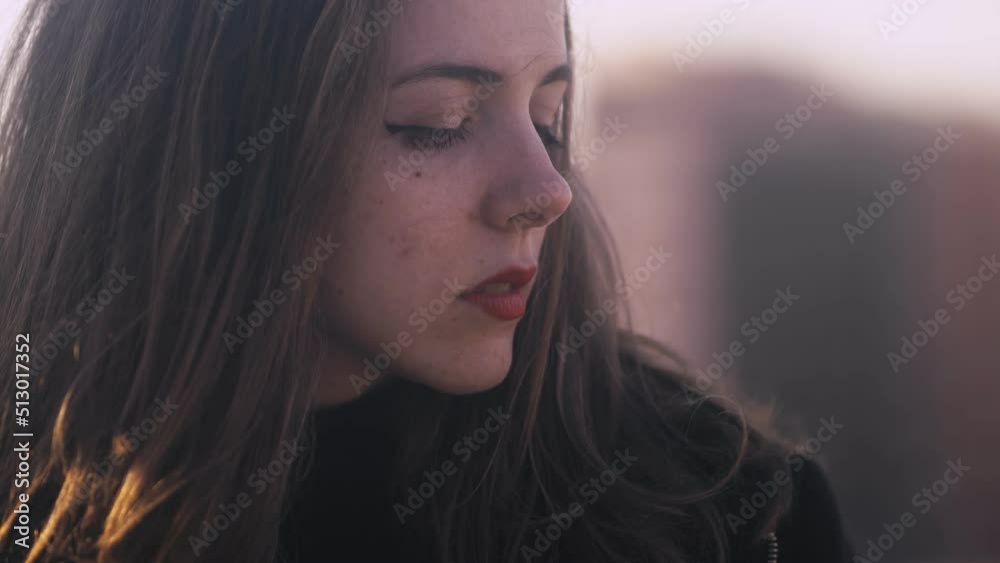 sadness, thoughts - sad pensive woman on the terrace looks down thinking sadness, thoughts - sad pensive woman on the terrace looks down thinking