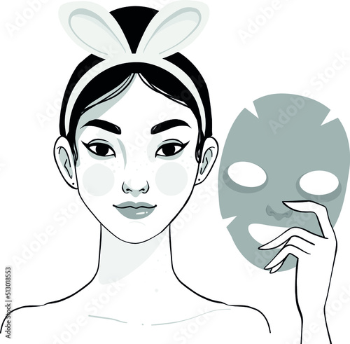 woman holding facial mask