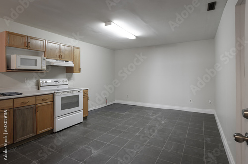 legal basement suite vacant dusty floor kitchen
