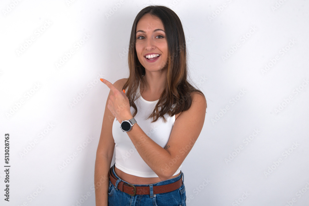 MODEL pointing away and smiling to you. Look over there! MODEL pointing away and smiling to you. Look over there!
