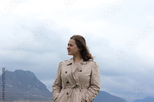 A girl of European appearance in nature, in the mountains. © Ольга Кожина