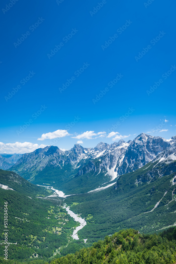 Albanian Alps view. Accursed Mountains landscape viewed from Valbona and Theth hiking trail in Albania, popular hiking trail in the Albanian Alps.