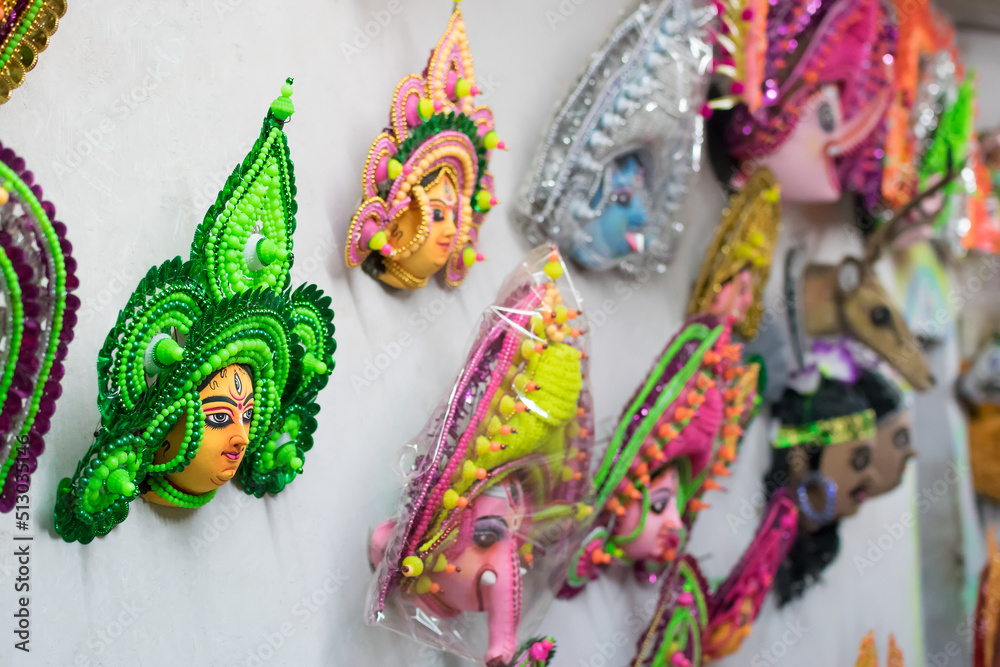 Colorful Chhau (or chhou) mask , handicrafts on display for sale - at Charida, Purulia - Bangla (formerly West Bengal), India. Chhau or Chhou is traditional tribal dance festival of India.