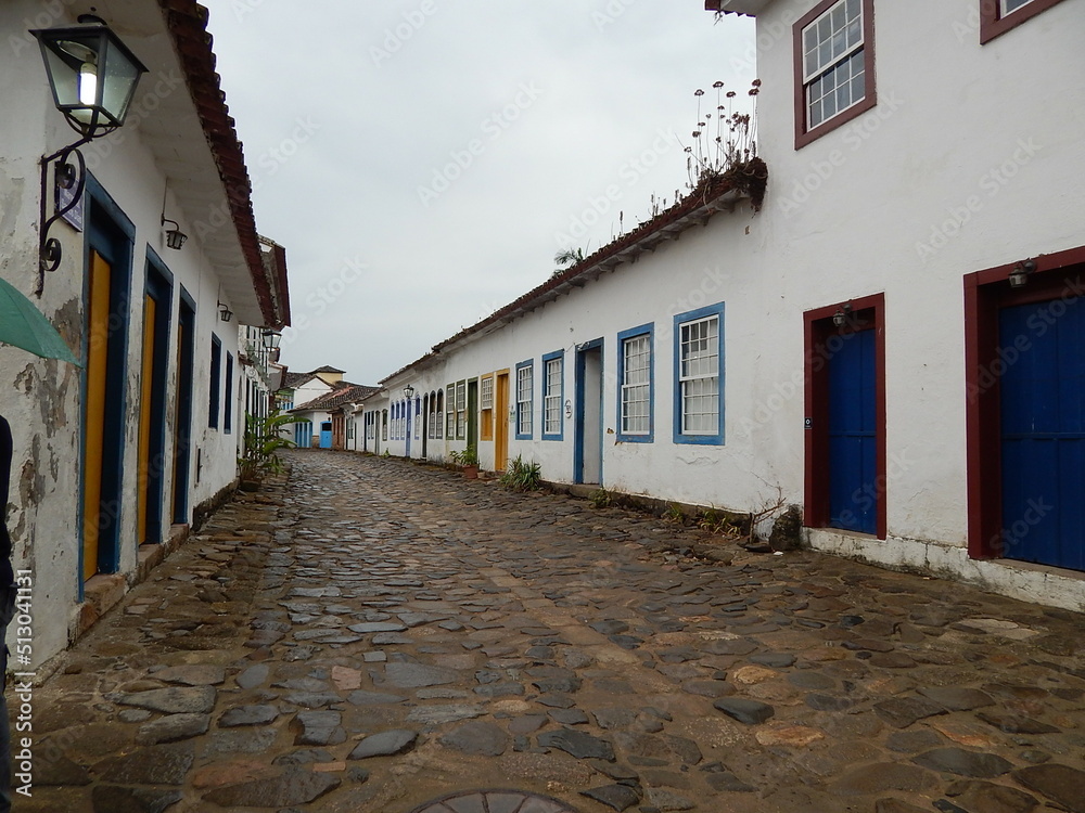 Street of historical center in Paraty, Rio de Janeiro, Brazil. Paraty is a preserved Portuguese colonial and Brazilian Imperial municipality