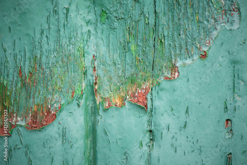 ein idealer Hintergrund, alte grüne Holzwand mit abblätternder Farbe