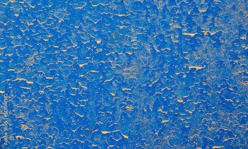 old peeling paint on grunge blue concrete wall background