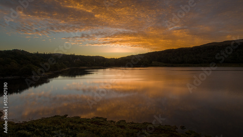 A deep orange Sunrise over Loch Aline  Scotland 