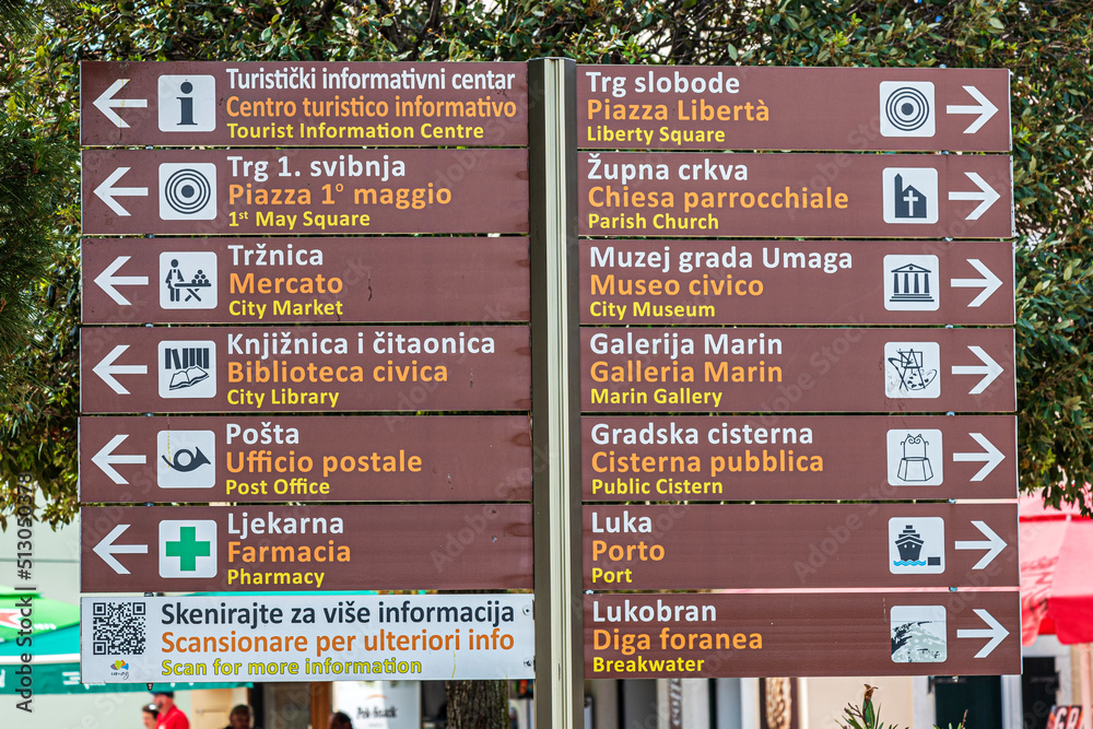 Obraz premium Street signs marking the direction to the sites to visit in Umag, Croatia