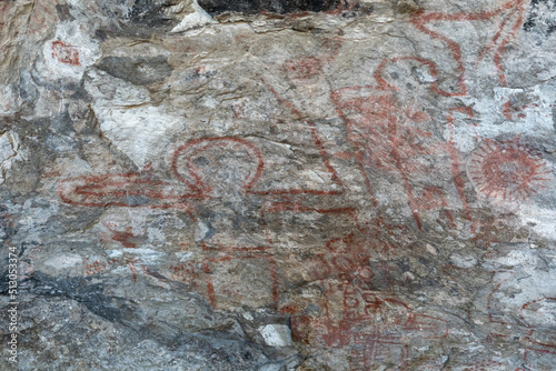 5,000 year old pictograph rock art paintings in the Mitla Caves photo