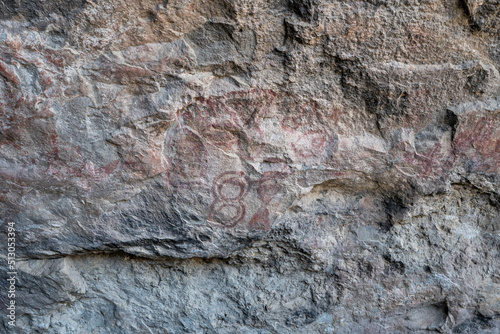 5,000 year old pictograph rock art paintings in the Mitla Caves photo