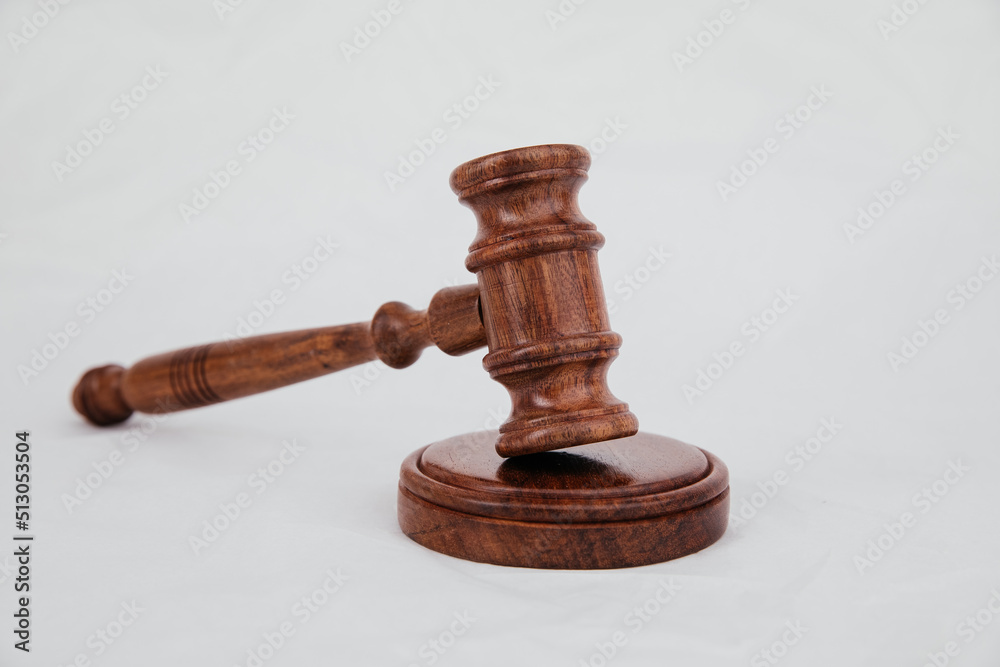 Judge gavel close-up on a white background Judge gavel close-up on a white background