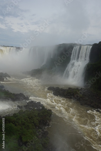 The photo shows a beautiful landscape of Iguazu Falls     a complex of 275 waterfalls on the Iguazu River  located on the border of Brazil  Paran   state  and Argentina  Misiones province .