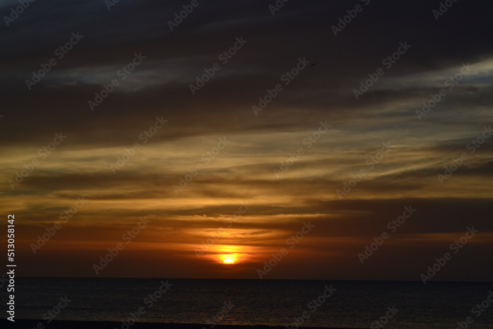 sunset over the sea sunset over the sea