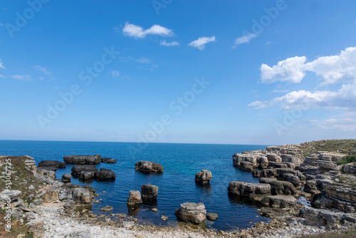 rock formations with blue cloudy sky
