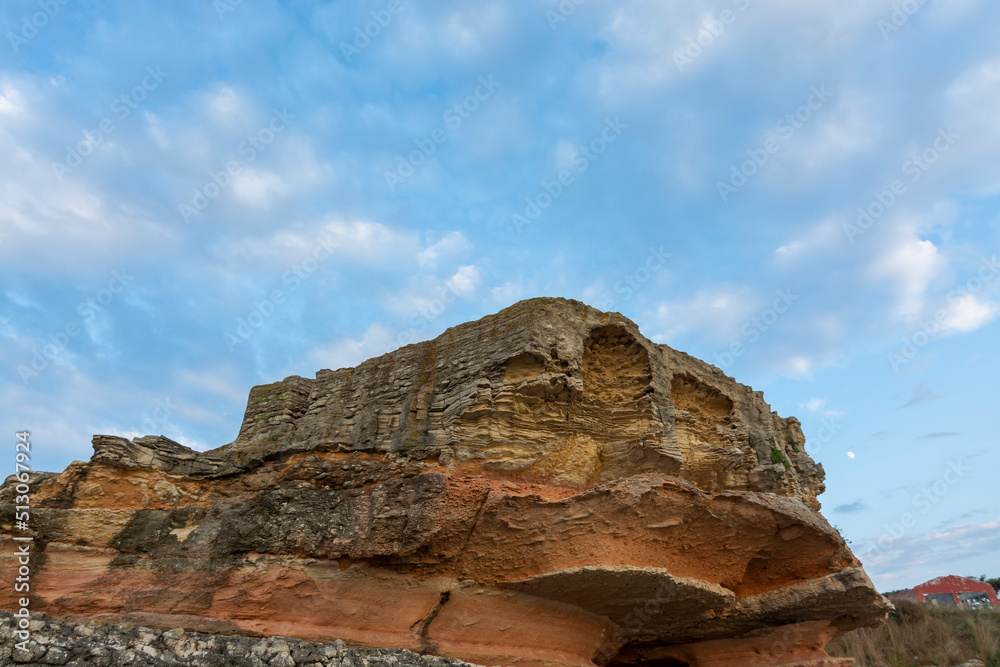 rock formations and cloudy sky