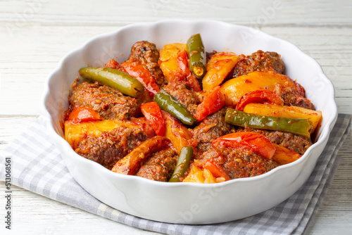 Traditional Homemade Turkish Food Kofte - Kofta with Tomato Sauce and Potatoes. (Turkish name; Izmir kofte)