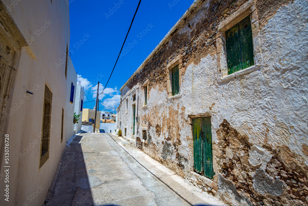Architectural buildings walking by the the streets of Chora village in Kythira island , Greece. Urban photography of the picturesque Chora village in Kythera island.