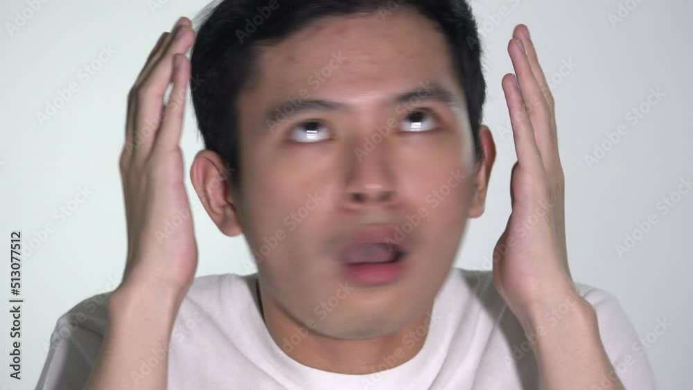 A Stressed Asian Man Isolated A Stressed Asian Man Isolated