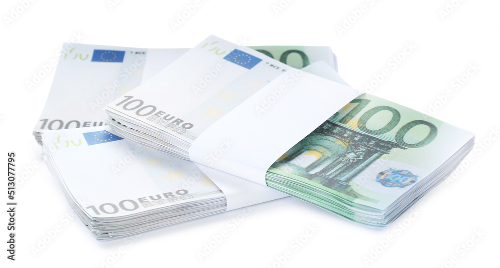 Stacks of euro banknotes isolated on white. Money and finance Stacks of euro banknotes isolated on white. Money and finance