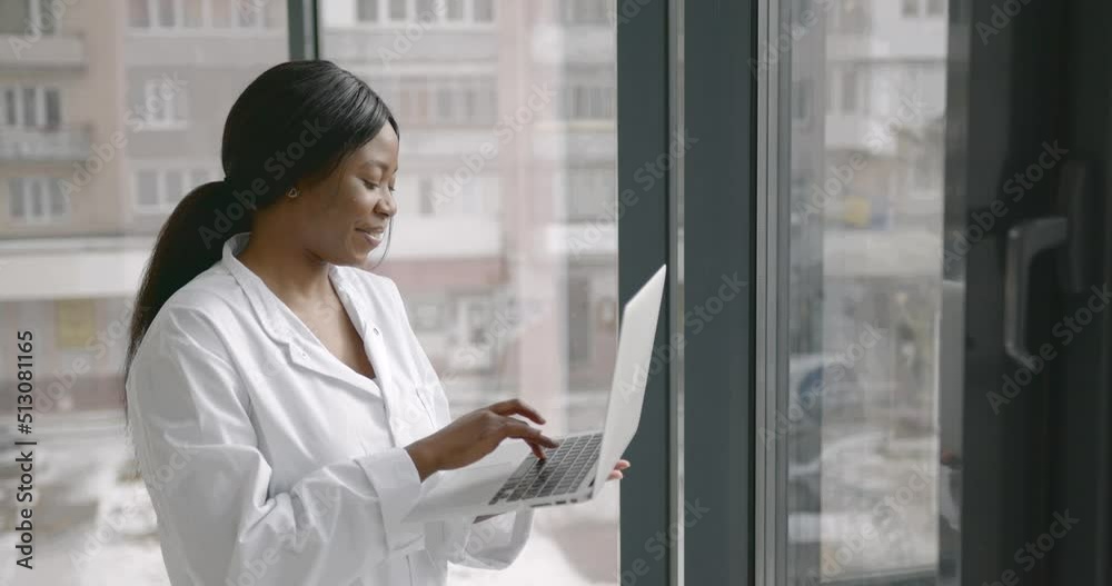Female dietician working with laptop in office Female dietician working with laptop in office