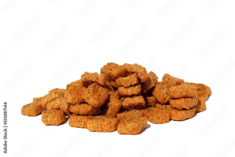 Heap of brown crackers on a white isolated background. Heap of brown crackers on a white isolated background.