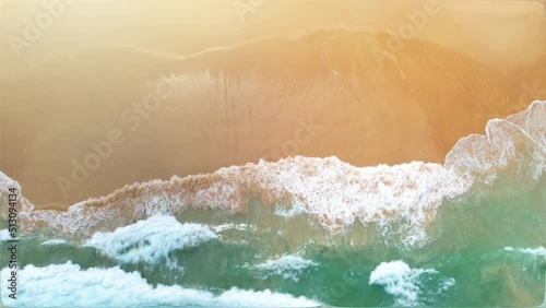 Aerial view of Phuket tropical beach in the high season in Thailand, A beautiful scene of the sea on the wave-covered sandy beach. overlooking the blue sea and clear water 4k. UHD footage 3840x2160p