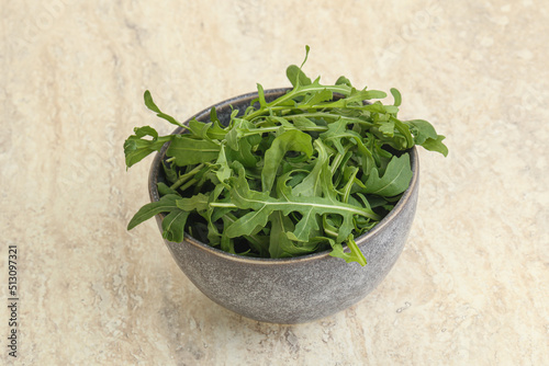 Fresh green arugula in the bowl