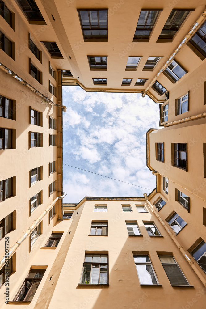 Photograph of sky inside courtyard of well Photograph of sky inside courtyard of well