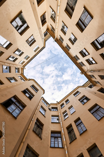 Photograph of sky inside courtyard of well
