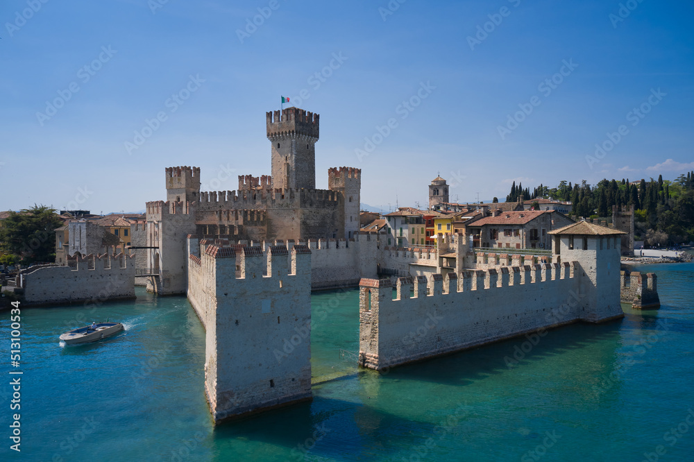 Lago di Garda, Lombardy region of Italy drone view. Aerial view of Sirmione, Lake Garda. View Town of Sirmione entrance walls view.