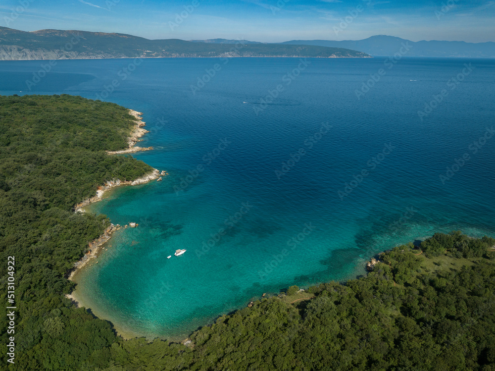 Bay with turquoise crystal clear water on island  Krk, Kvarner, Croatia