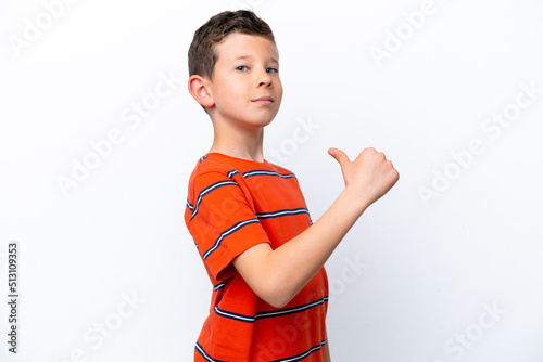 Little boy isolated on white background proud and self-satisfied