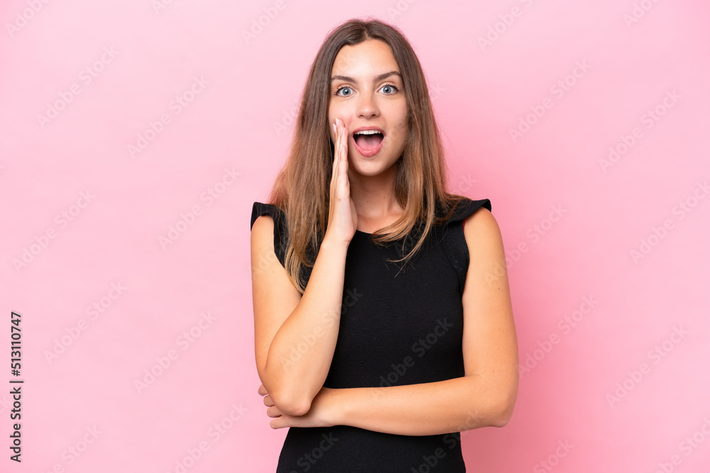 Young caucasian woman isolated on pink background with surprise and shocked facial expression Young caucasian woman isolated on pink background with surprise and shocked facial expression