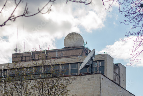industrial building with radar and satellite antenna