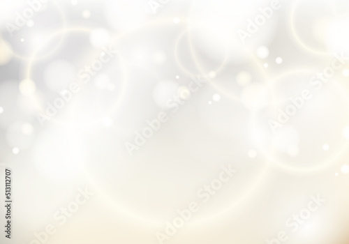 Abstract elegant blurred white background with golden light bokeh. Festive defocused white lights luxury style