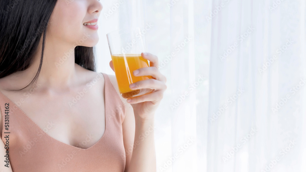 Lifestyle beautiful beauty woman Asian cute girl feel happy enjoy eating diet food , drinking orange juice for good health in the morning Lifestyle beautiful beauty woman Asian cute girl feel happy enjoy eating diet food , drinking orange juice for good health in the morning