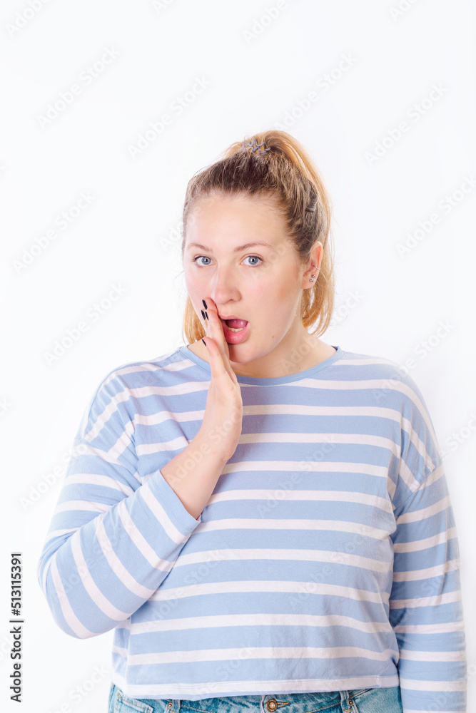 Portrait of beautiful wondered young woman with surprised face standing at isolated white background Portrait of beautiful wondered young woman with surprised face standing at isolated white background