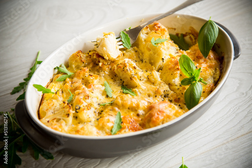 baked cauliflower with vegetables and cheese and scrambled eggs