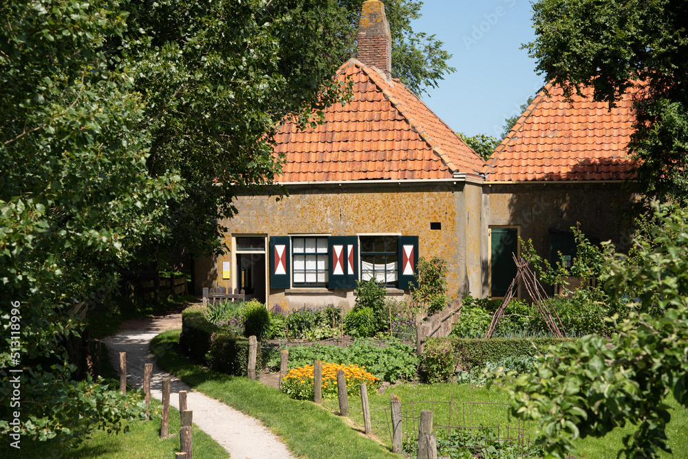 Enkhuizen, Netherlands. June 2022. Fishermen's cottages and historic streets at the Zuiderzee Museum in Enkhuizen.