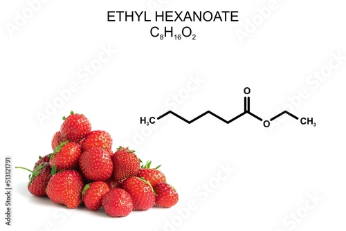 Group of strawberrys and structural formula of ethyl hexanoate.