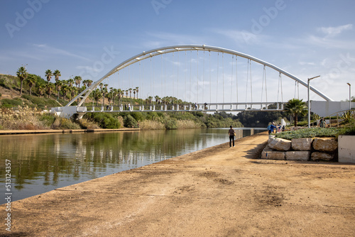Park Nahal in Hadera pedestrian bridge over the river Hadera and power station Orot Rabin © luciano