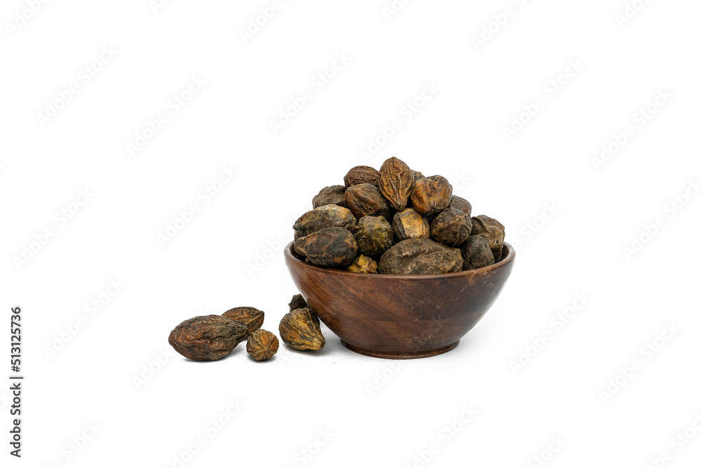 Organic Badi Harad fruit (Terminalia chebula) on white background Organic Badi Harad fruit (Terminalia chebula) on white background