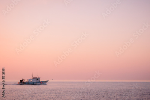 Lovely romantic warm sunrise at the Sicilian East Coast in Italy, Europe  © andiz275