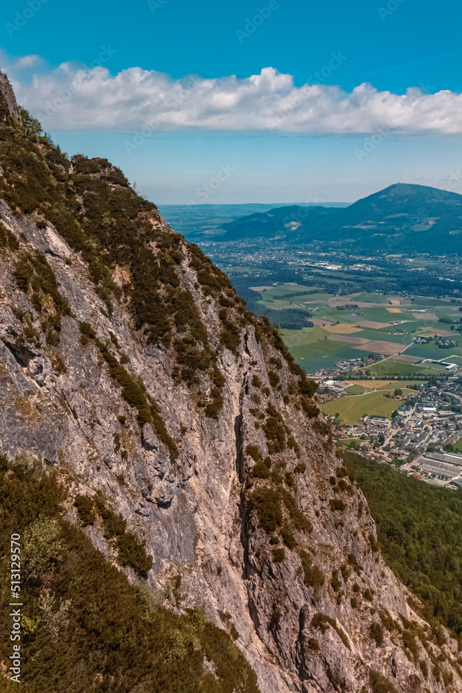 Beautiful alpine summer view with the far away city of Salzburg at the famous Untersberg mountain, Groedig, Salzburg, Austria