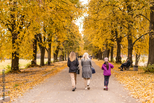 Happy family playing in autumn park